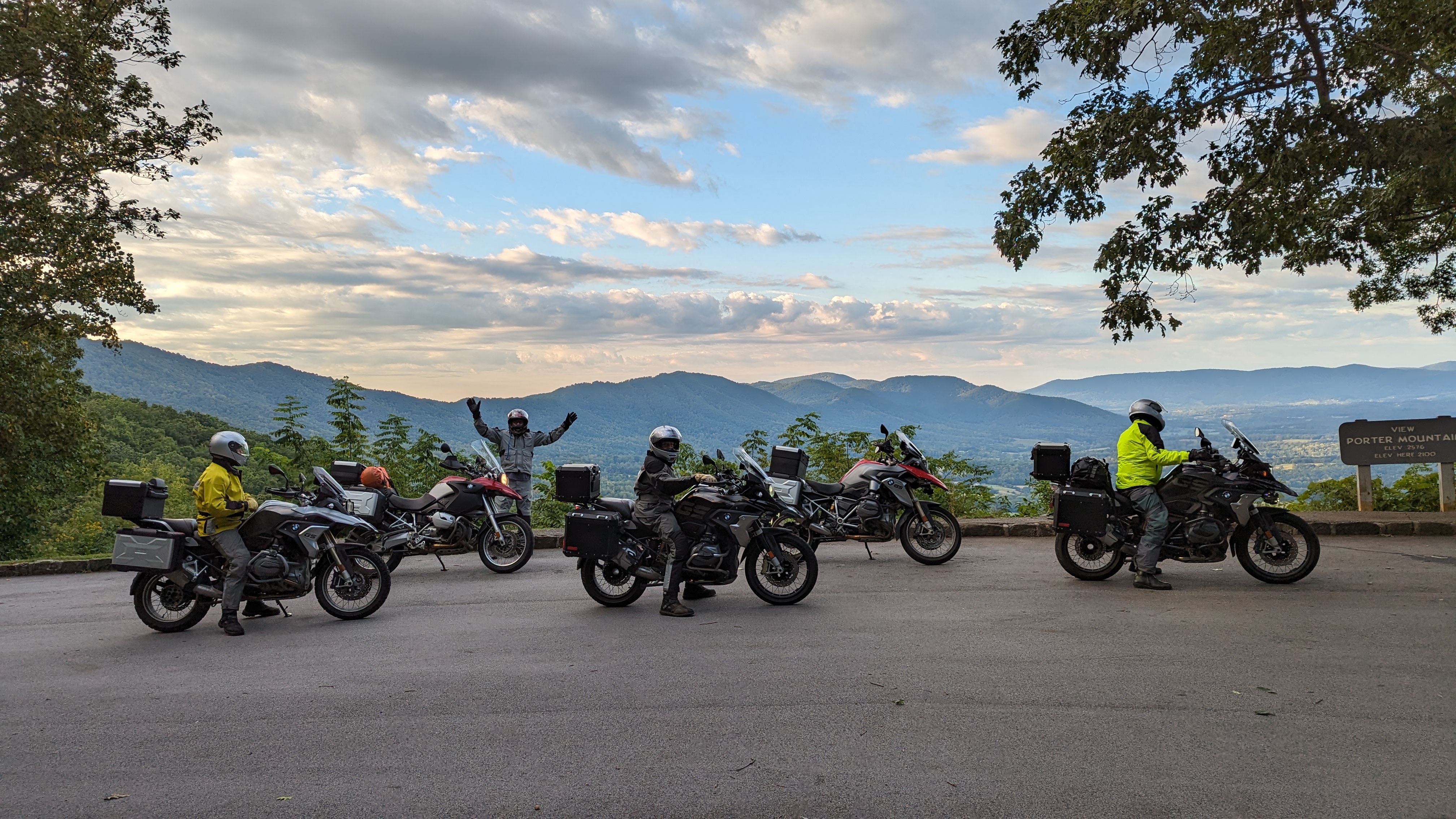 Five motorcycles stopped at a pullout on the Blue Ridge Parkway.